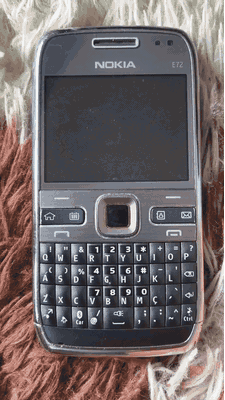 The Nokia e72 I bought, running my launcher